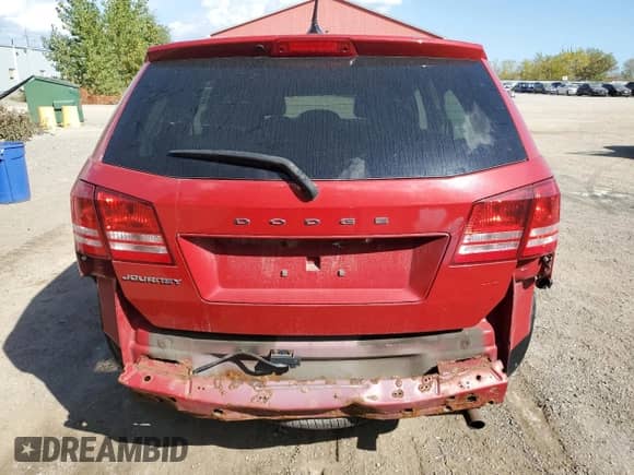 2012 Dodge Journey American Value z VIN 3C4PDCAB9CT281467, wystawiony jako Copart lot #85563765 z przebiegiem 211 195 mil mil oraz Czysty tytuł • Clean title. Historia ofert i sprzedaży dostępna na DreamBid. Obrazek 6.