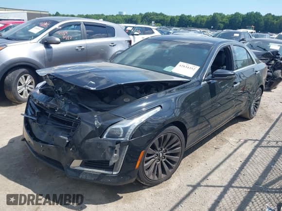 ✅ 2017 Cadillac CTS Luxury AWD • VIN: 1G6AX5SX8H0163808 • Лот: 42834352. Опубликован ранее на IAAI с пробегом Не указан. Бесплатный доступ к архиву аукционных продаж из США и подробный отчёт об истории автомобиля на DreamBid. Изображение 16.