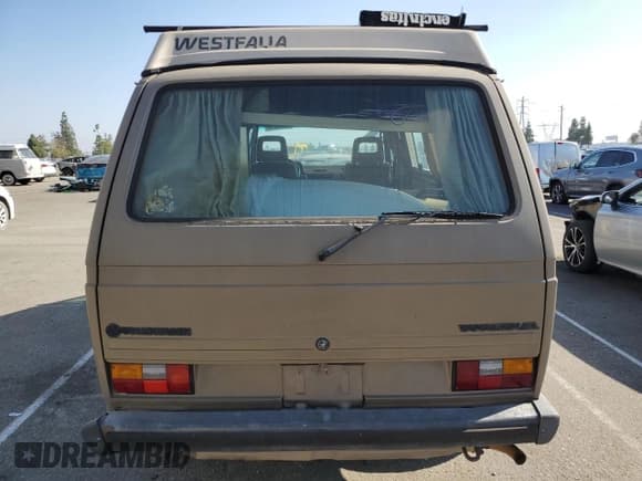 ✅ 1985 Volkswagen Vanagon GL • VIN: WV2ZB0251FH003849 • Lot: 69142014. Wystawiony na Copart z przebiegiem 172 853 mil. Bezpłatny archiwum sprzedaży aukcyjnych z USA i szczegółowy raport historii pojazdu na DreamBid. Zdjęcie 6.