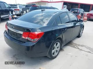 ✅ 2015 Chevrolet Cruze LT • VIN: 1G1PE5SB3F7180658 • Lot: 42329161. Listed on IAAI with 168,731 mi. Free auction sales archive from the USA and detailed vehicle history report at DreamBid. Image 4.