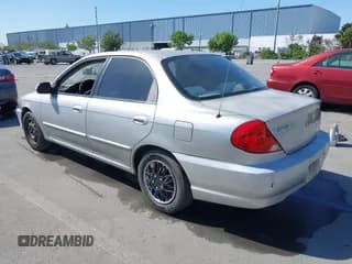 ✅ 2003 Kia Spectra • VIN: KNAFB121235258377 • Лот: 42146691. Опубликован ранее на IAAI с пробегом 174 992 миль. Бесплатный доступ к архиву аукционных продаж из США и подробный отчёт об истории автомобиля на DreamBid. Изображение 3.