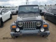 ✅ 2005 Jeep Wrangler Unlimited • VIN: 1J4FA44S25P335120 • Lot: 70306025. Listed on Copart with 137,315 mi. Free auction sales archive from the USA and detailed vehicle history report at DreamBid. Image 5.