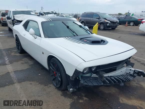✅ 2019 Dodge Challenger R/T Scat Pack • VIN: 2C3CDZFJ5KH595355 • Lot: 43514918. Listed on IAAI with 63,057 mi. Free auction sales archive from the USA and detailed vehicle history report at DreamBid. Image 1.