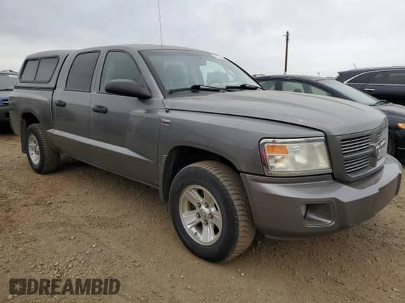 2010 Dodge Dakota SXT с VIN 1D7CW3GP3AS161843, выставлен на аукционе Copart как лот 76721334 с пробегом 308 931 миль миль и Чистый • Clean title. История ставок и продаж доступна на DreamBid. Изображение 4.
