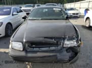 ✅ 2003 Ford Police Interceptor Street Appear • VIN: 2FAFP71W13X202231 • Lot: 70451825. Listed on Copart with 168,356 mi. Free auction sales archive from the USA and detailed vehicle history report at DreamBid. Image 5.