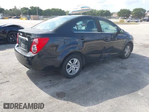 ✅ 2014 Chevrolet Sonic LT • VIN: 1G1JC5SH9E4151553 • Lot: 43789246. Listed on IAAI with 95,937 mi. Free auction sales archive from the USA and detailed vehicle history report at DreamBid. Image 4.