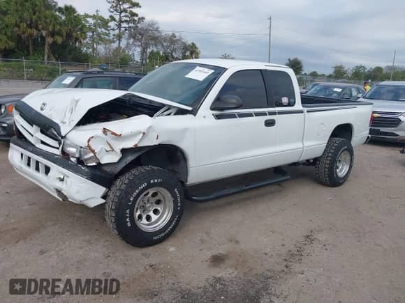 2002 Dodge Dakota Sport z VIN 1B7GL32X22S508401, wystawiony jako IAAI lot #41591465 z przebiegiem Nie podano mil oraz . Historia ofert i sprzedaży dostępna na DreamBid. Obrazek 17.