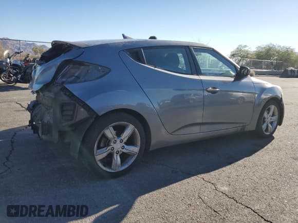 ✅ 2013 Hyundai Veloster w/Gray Int • VIN: KMHTC6ADXDU088249 • Lot: 76622474. Listed on Copart with 87,096 mi. Free auction sales archive from the USA and detailed vehicle history report at DreamBid. Image 3.