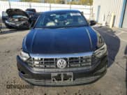 ✅ 2021 Volkswagen Jetta S • VIN: 3VWC57BU9MM053061 • Lot: 87047475. Wystawiony na Copart z przebiegiem 124 642 mil. Bezpłatny archiwum sprzedaży aukcyjnych z USA i szczegółowy raport historii pojazdu na DreamBid. Zdjęcie 5.