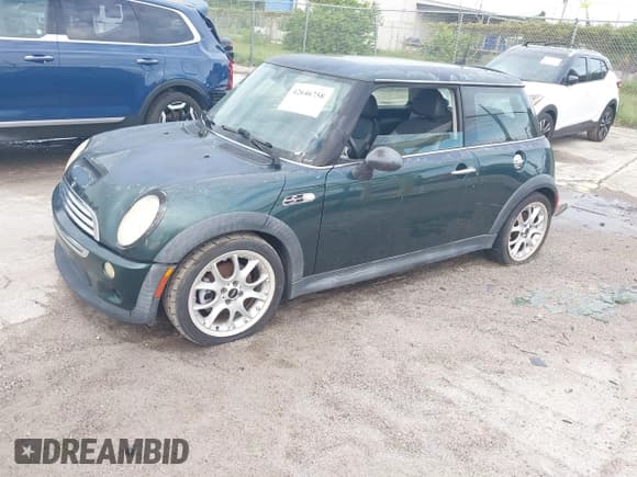 ✅ 2006 MINI Hardtop S • VIN: WMWRE33586TJ36382 • Lot: 42646758. Listed on IAAI with 99,766 mi. Free auction sales archive from the USA and detailed vehicle history report at DreamBid. Image 2.
