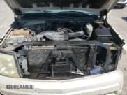 ✅ 2004 Cadillac Escalade • VIN: 1GYEK63N04R103148 • Lot: 69335404. Wystawiony na Copart z przebiegiem Nie podano. Bezpłatny archiwum sprzedaży aukcyjnych z USA i szczegółowy raport historii pojazdu na DreamBid. Zdjęcie 12.