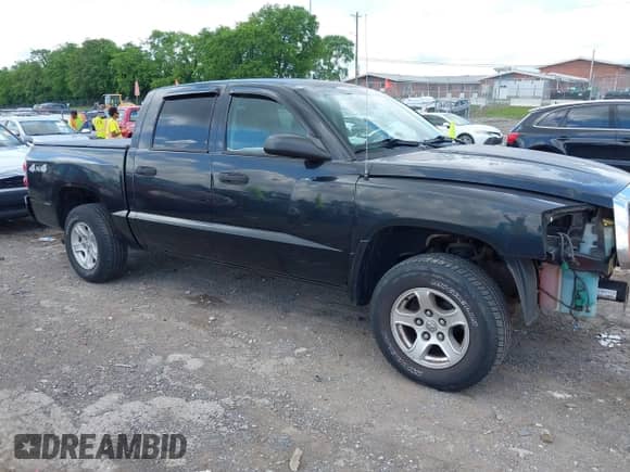2007 Dodge Dakota SLT with VIN 1D7HW48K17S118416, listed as a IAAI auction lot 42209225 with 133,678 mi miles and . Bid and sale history available at DreamBid. Image 1.