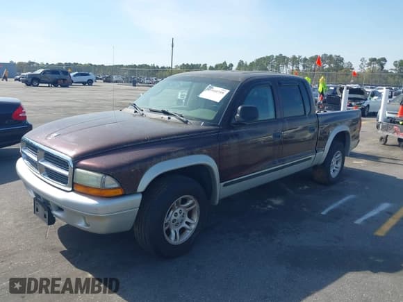 ✅ 2004 Dodge Dakota SLT • VIN: 1D7HL48N74S586018 • Lot: 41910755. Listed on IAAI with 259,924 mi. Free auction sales archive from the USA and detailed vehicle history report at DreamBid. Image 2.
