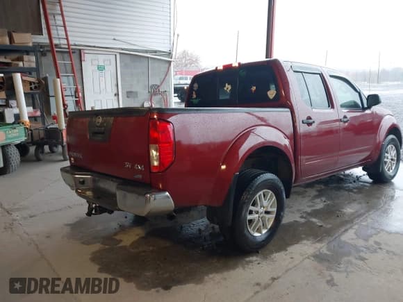✅ 2018 Nissan Frontier Pro-4X • VIN: 1N6DD0EV3JN770799 • Lot: 43547945. Listed on IAAI with 99,295 mi. Free auction sales archive from the USA and detailed vehicle history report at DreamBid. Image 4.