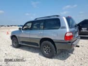 ✅ 2001 Lexus LX 470 • VIN: JTJHT00W313504330 • Lot: 61126435. Listed on Copart with 87,049 mi. Free auction sales archive from the USA and detailed vehicle history report at DreamBid. Image 2.