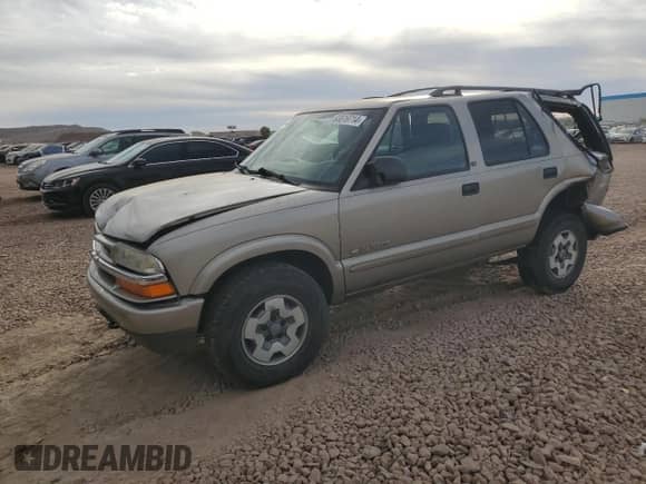 2003 Chevrolet Blazer LS z VIN 1GNDT13X73K112544, wystawiony jako Copart lot #83819714 z przebiegiem 96 738 mil mil oraz Szkoda całkowita • Salvage title. Historia ofert i sprzedaży dostępna na DreamBid. Obrazek 1.