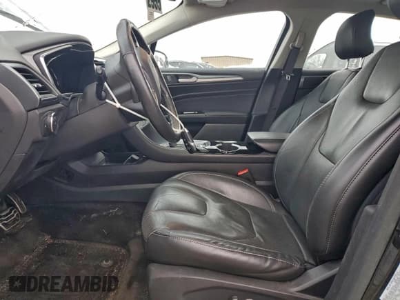 ✅ 2015 Ford Fusion Titanium Hybrid • VIN: 3FA6P0RU6FR179817 • Lot: 95251945. Wystawiony na Copart z przebiegiem 115 636 mil. Bezpłatny archiwum sprzedaży aukcyjnych z USA i szczegółowy raport historii pojazdu na DreamBid. Zdjęcie 7.