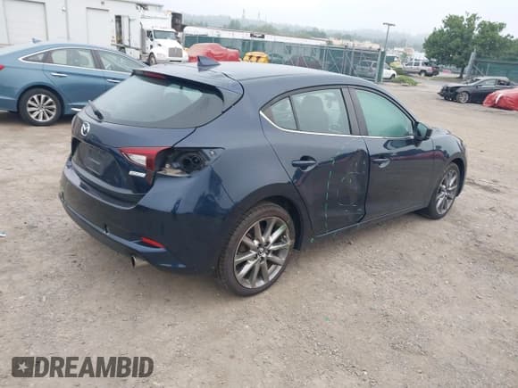 ✅ 2018 Mazda 3 Touring • VIN: 3MZBN1L32JM163007 • Lot: 42971840. Wystawiony na IAAI z przebiegiem 93 319 mil. Bezpłatny archiwum sprzedaży aukcyjnych z USA i szczegółowy raport historii pojazdu na DreamBid. Zdjęcie 4.
