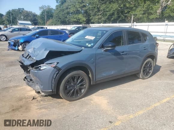 ✅ 2021 Mazda CX-5 Carbon Edition • VIN: JM3KFBCY7M0453842 • Лот: 84977175. Опубликован ранее на Copart с пробегом 50 274 миль. Бесплатный доступ к архиву аукционных продаж из США и подробный отчёт об истории автомобиля на DreamBid. Изображение 1.