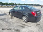 ✅ 2014 Chevrolet Sonic LT • VIN: 1G1JC5SH9E4151553 • Lot: 43789246. Listed on IAAI with 95,937 mi. Free auction sales archive from the USA and detailed vehicle history report at DreamBid. Image 3.