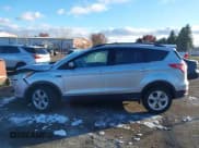 ✅ 2016 Ford Escape SE • VIN: 1FMCU9G98GUA28086 • Lot: 43667528. Listed on IAAI with 27,553 mi. Free auction sales archive from the USA and detailed vehicle history report at DreamBid. Image 14.