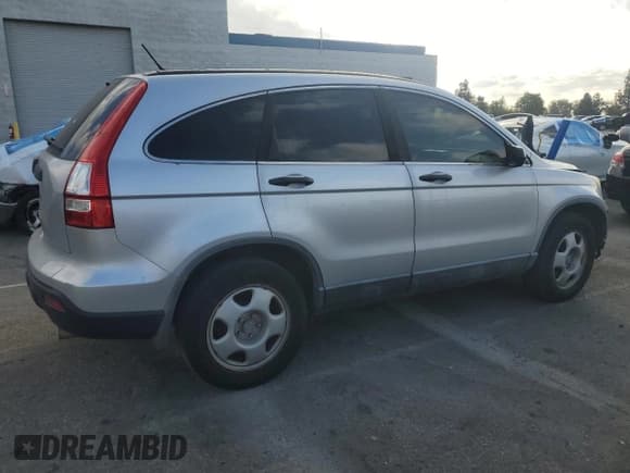 ✅ 2009 Honda CR-V LX • VIN: 5J6RE38349L012831 • Лот: 92696945. Опубликован ранее на Copart с пробегом 245 918 миль. Бесплатный доступ к архиву аукционных продаж из США и подробный отчёт об истории автомобиля на DreamBid. Изображение 3.