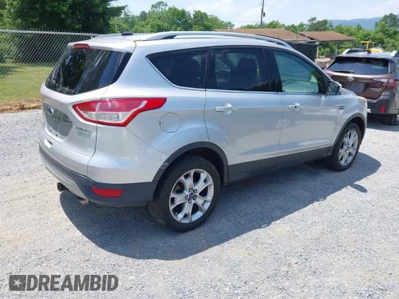 ✅ 2015 Ford Escape Titanium • VIN: 1FMCU0J90FUB24894 • Lot: 42468012. Listed on IAAI with 245,683 mi. Free auction sales archive from the USA and detailed vehicle history report at DreamBid. Image 4.