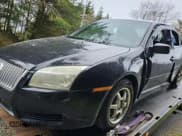 ✅ 2006 Mercury Milan • VIN: 3MEFM07Z06R629378 • Lot: 42087954. Listed on IAAI with 84,404 mi. Free auction sales archive from the USA and detailed vehicle history report at DreamBid. Image 2.