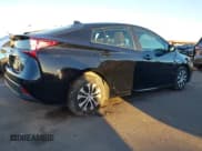 ✅ 2021 Toyota Prius L Eco • VIN: JTDKAMFU5M3146454 • Lot: 43462876. Wystawiony na IAAI z przebiegiem 93 810 mil. Bezpłatny archiwum sprzedaży aukcyjnych z USA i szczegółowy raport historii pojazdu na DreamBid. Zdjęcie 4.