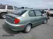 2003 Hyundai Accent GL с VIN KMHCG35C13U277732, выставлен на аукционе Copart как лот 72276634 с пробегом 135 176 миль миль и Списание • Salvage title. История ставок и продаж доступна на DreamBid. Изображение 3.