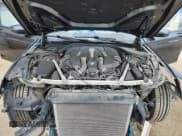 ✅ 2018 BMW 7 Series 750i xDrive • VIN: WBA7B0C59JG527315 • Lot: 69630535. Wystawiony na Copart z przebiegiem 47 063 mil. Bezpłatny archiwum sprzedaży aukcyjnych z USA i szczegółowy raport historii pojazdu na DreamBid. Zdjęcie 11.