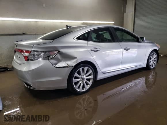 2012 Hyundai Azera с VIN KMHFH4JG6CA150808, выставлен на аукционе Copart как лот 46639735 с пробегом 100 089 миль миль и Списание • Salvage title. История ставок и продаж доступна на DreamBid. Изображение 3.