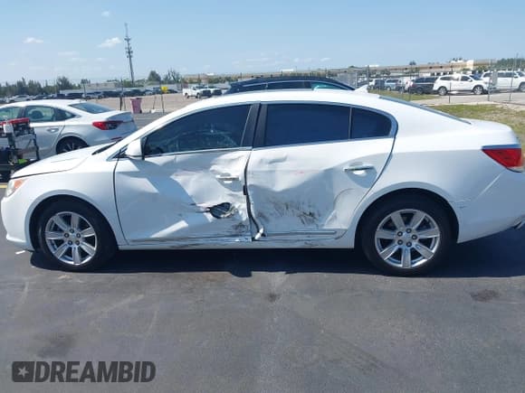 ✅ 2012 Buick LaCrosse Leather • VIN: 1G4GC5E33CF350242 • Лот: 42231224. Опубликован ранее на IAAI с пробегом 92 036 миль. Бесплатный доступ к архиву аукционных продаж из США и подробный отчёт об истории автомобиля на DreamBid. Изображение 14.