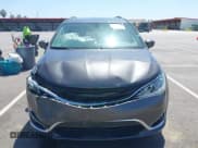 ✅ 2018 Chrysler Pacifica Hybrid Touring L • VIN: 2C4RC1L71JR129532 • Lot: 42064129. Listed on IAAI with 129,665 mi. Free auction sales archive from the USA and detailed vehicle history report at DreamBid. Image 12.