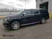 2015 Chevrolet Suburban LTZ with VIN 1GNSCKKC3FR291995, listed as a Copart auction lot 51656815 with 156,504 mi miles and Clean title. Bid and sale history available at DreamBid. Image 1.