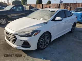 2018 Hyundai Elantra Sport z VIN KMHD04LB9JU704015, wystawiony jako Copart lot #90088295 z przebiegiem Nie podano mil oraz Nie do naprawy • Non repairable. Historia ofert i sprzedaży dostępna na DreamBid. Obrazek 1.