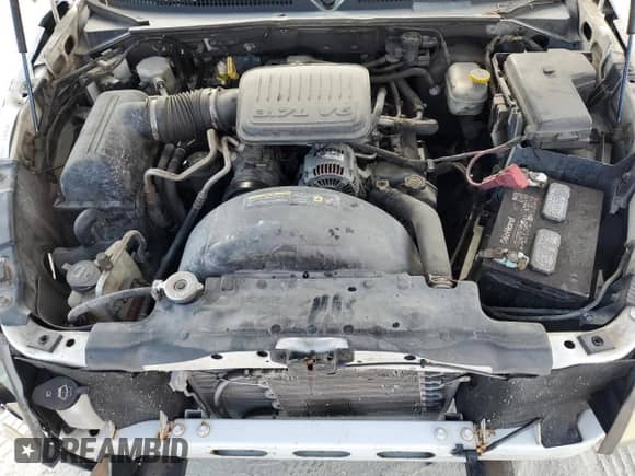 2006 Dodge Dakota SLT z VIN 1D7HE48KX6S576070, wystawiony jako Copart lot #57799605 z przebiegiem 236 035 mil mil oraz Szkoda całkowita • Salvage title. Historia ofert i sprzedaży dostępna na DreamBid. Obrazek 11.