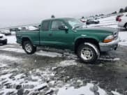 ✅ 2004 Dodge Dakota SLT • VIN: 1D7HG42N64S597573 • Lot: 87504315. Wystawiony na Copart z przebiegiem 188 865 mil. Bezpłatny archiwum sprzedaży aukcyjnych z USA i szczegółowy raport historii pojazdu na DreamBid. Zdjęcie 11.
