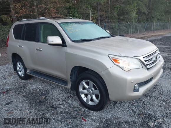 ✅ 2011 Lexus GX 460 • VIN: JTJBM7FX6B5031623 • Lot: 43296109. Listed on IAAI with 212,918 mi. Free auction sales archive from the USA and detailed vehicle history report at DreamBid. Image 1.