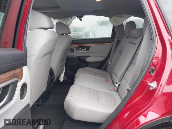 ✅ 2021 Honda CR-V Touring • VIN: 2HKRW2H9XMH663315 • Lot: 42188893. Listed on IAAI with 26,203 mi. Free auction sales archive from the USA and detailed vehicle history report at DreamBid. Image 8.