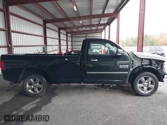 2016 Ram 1500 SLT with VIN 3C6JR7ET4GG283909, listed as a IAAI auction lot 43462033 with 91,066 mi miles and . Bid and sale history available at DreamBid. Image 14.