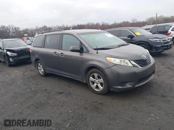 ✅ 2013 Toyota Sienna LE • VIN: 5TDKK3DC6DS371479 • Lot: 43780135. Listed on IAAI with 210,325 mi. Free auction sales archive from the USA and detailed vehicle history report at DreamBid. Image 1.