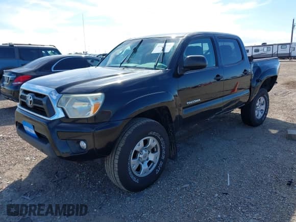 ✅ 2015 Toyota Tacoma • VIN: 3TMLU4EN2FM169326 • Lot: 40689500. Listed on IAAI with 77,003 mi. Free auction sales archive from the USA and detailed vehicle history report at DreamBid. Image 2.