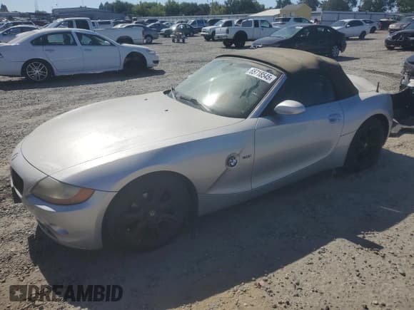 ✅ 2004 BMW Z4 3.0i • VIN: 4USBT53594LU07477 • Lot: 65718545. Listed on Copart with 124,545 mi. Free auction sales archive from the USA and detailed vehicle history report at DreamBid. Image 1.