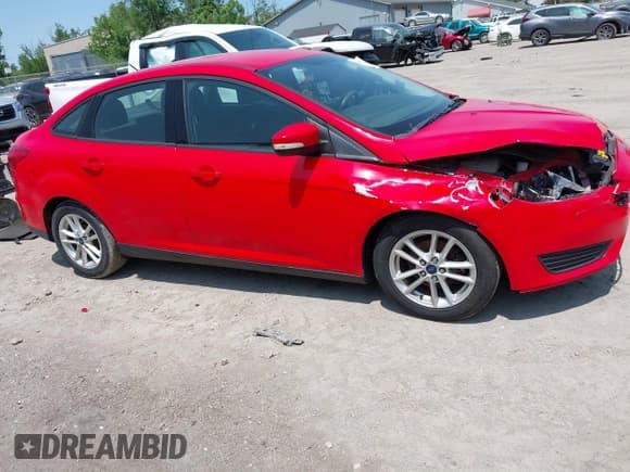 ✅ 2015 Ford Focus SE • VIN: 1FADP3F23FL354468 • Lot: 42395835. Listed on IAAI with 100,928 mi. Free auction sales archive from the USA and detailed vehicle history report at DreamBid. Image 13.