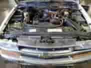 1999 Chevrolet Blazer LS z VIN 1GNDT13W7X2253305, wystawiony jako Copart lot #73501084 z przebiegiem 238 166 mil mil oraz Szkoda całkowita • Salvage title. Historia ofert i sprzedaży dostępna na DreamBid. Obrazek 12.