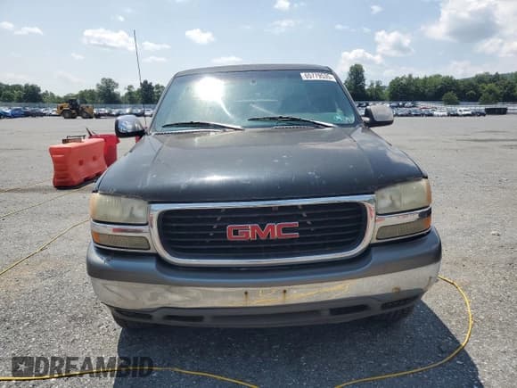 ✅ 1999 GMC Sierra 1500 SLE • VIN: 1GTEK19T0XZ526623 • Лот: 65779535. Опубликован ранее на Copart с пробегом Не указан. Бесплатный доступ к архиву аукционных продаж из США и подробный отчёт об истории автомобиля на DreamBid. Изображение 5.
