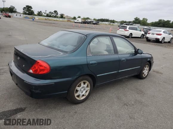✅ 2002 Kia Spectra • VIN: KNAFB121825181660 • Lot: 69515605. Wystawiony na Copart z przebiegiem 44 332 mil. Bezpłatny archiwum sprzedaży aukcyjnych z USA i szczegółowy raport historii pojazdu na DreamBid. Zdjęcie 3.
