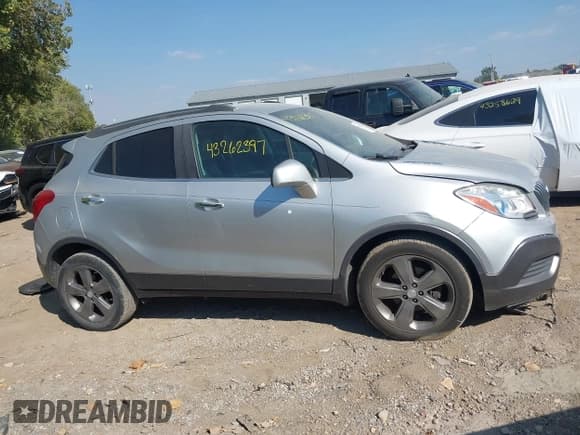 ✅ 2013 Buick Encore • VIN: KL4CJASB1DB121817 • Lot: 43262397. Listed on IAAI with 211,960 mi. Free auction sales archive from the USA and detailed vehicle history report at DreamBid. Image 13.
