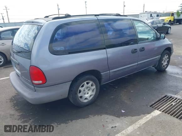 1997 Dodge Caravan Sport z VIN 2B4GP4436VR411449, wystawiony jako IAAI lot #42465067 z przebiegiem Nie podano mil oraz . Historia ofert i sprzedaży dostępna na DreamBid. Obrazek 4.